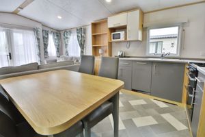 Dining area and kitchen- click for photo gallery